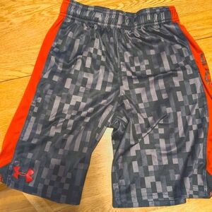 Youth medium under armor shorts. Black with red on side